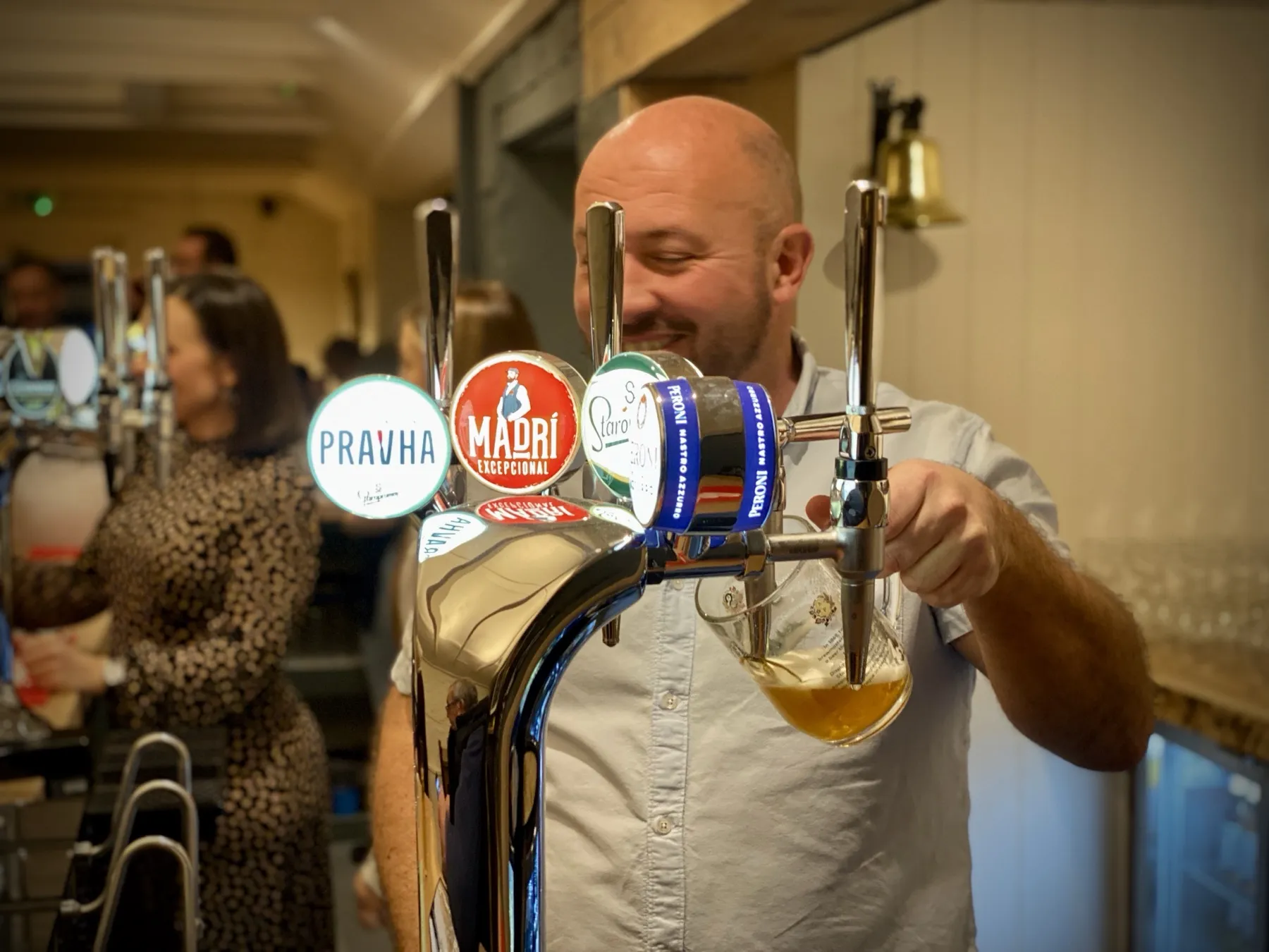 A pint being poured at the bar of The Richmond Arms